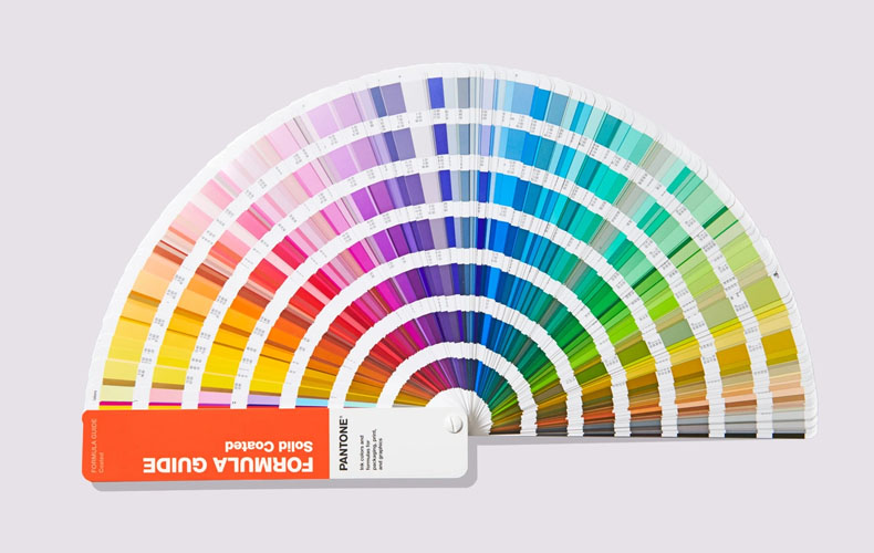 Pantone color formula guide used for precise custom fabric dyeing and highly accurate lab dip matching in activewear manufacturing.