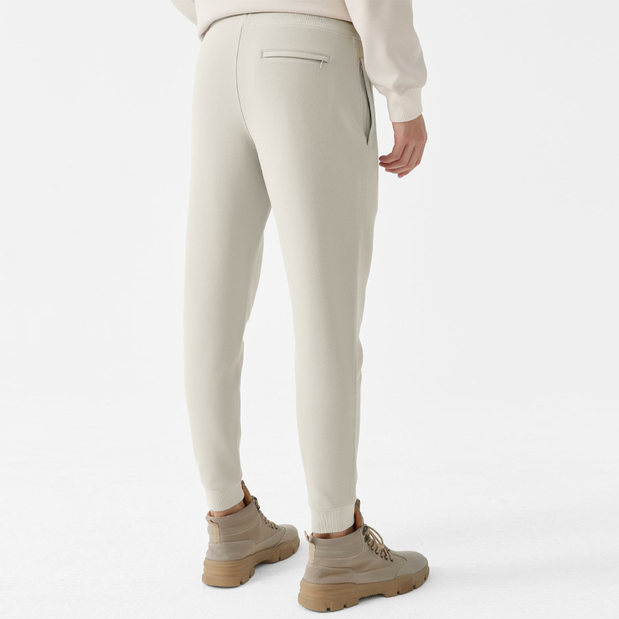 Beige fitted sweatpants back view