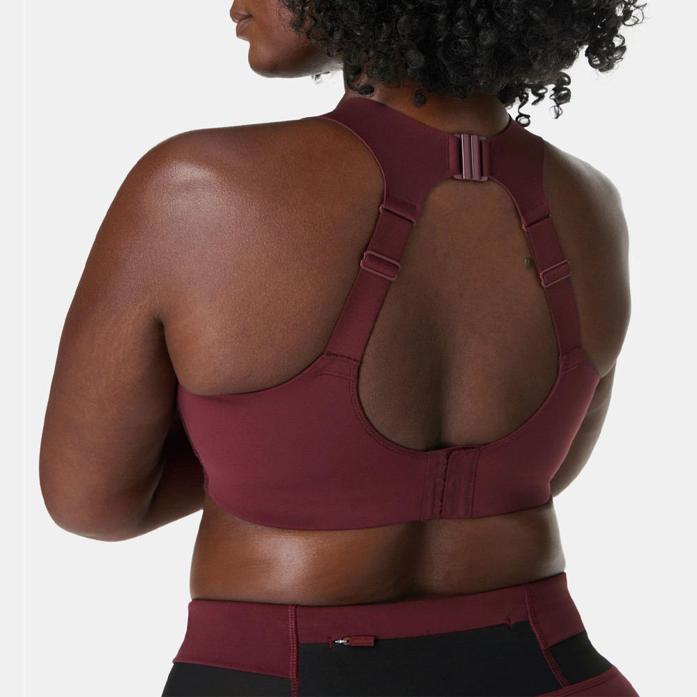 Clasp back sports bra with adjustable hook and eye