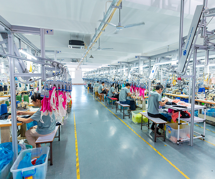 Energy-efficient and eco-friendly activewear manufacturing facility adhering to ISO and BSCI standards.