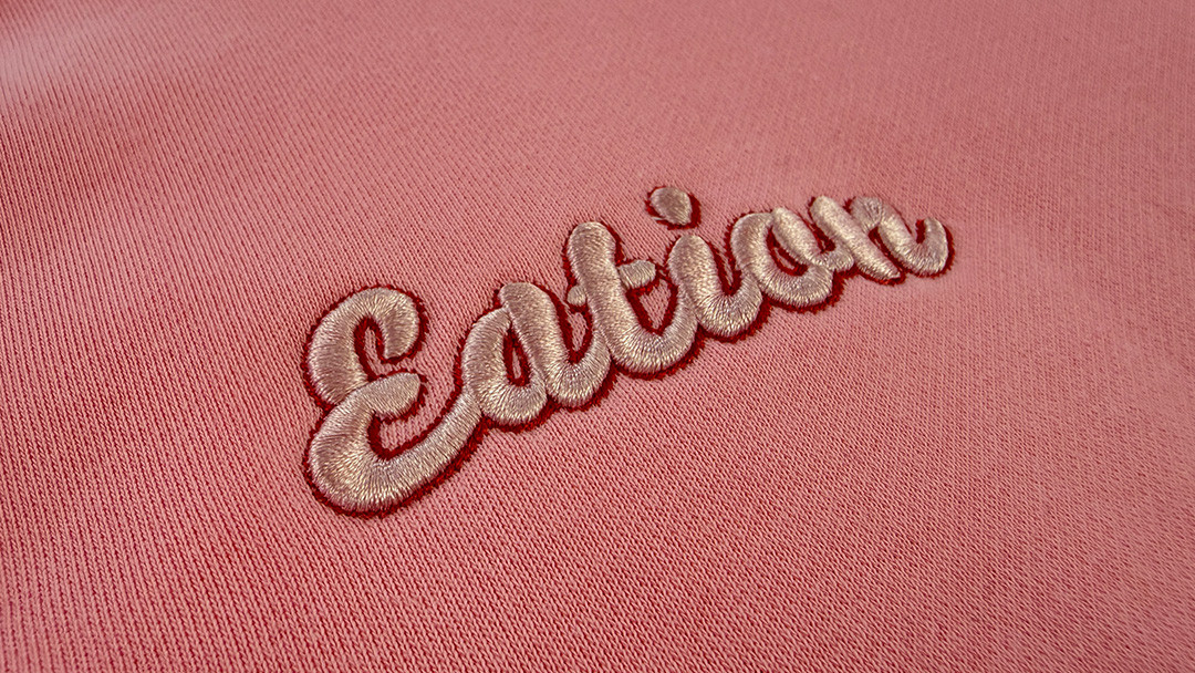 High-density custom embroidery on premium sportswear by Call The Style.