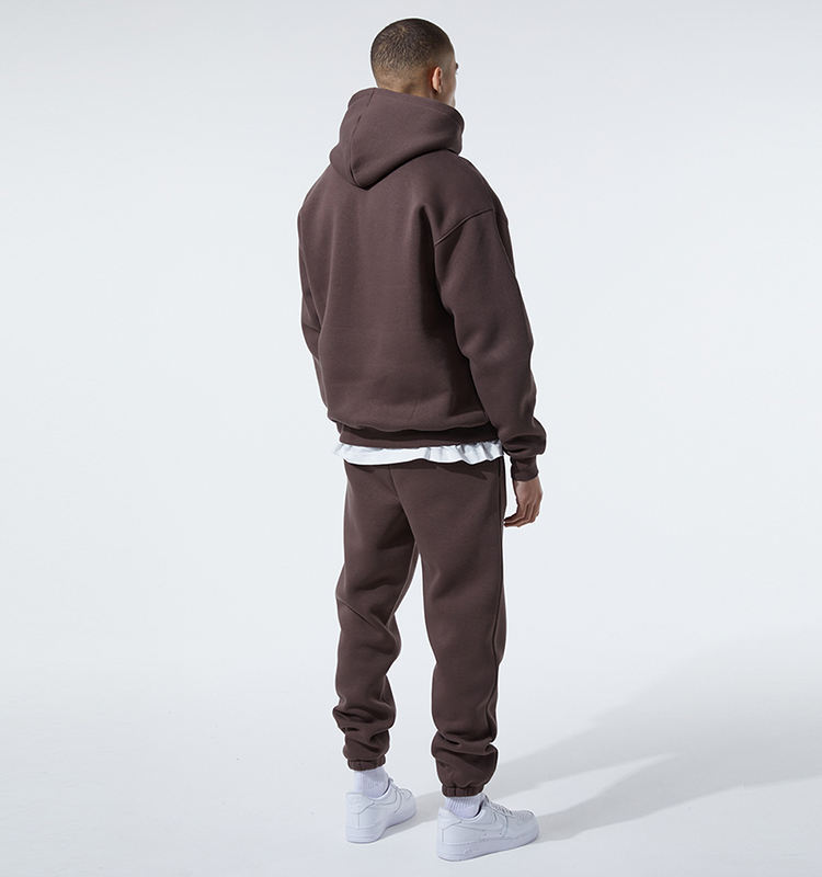 Oversized track pants and hoodie back view