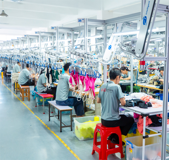 Precision sewing lines at Call The Style custom activewear manufacturing factory in Dongguan, ensuring premium quality control.