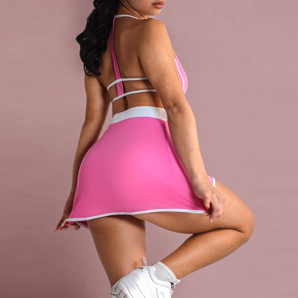 Pink sports bra and skort set back view