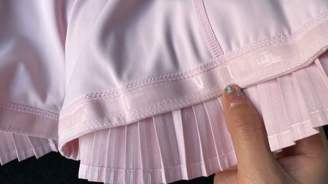 Macro detail of 15mm silicone gripper tape on activewear inner shorts hem