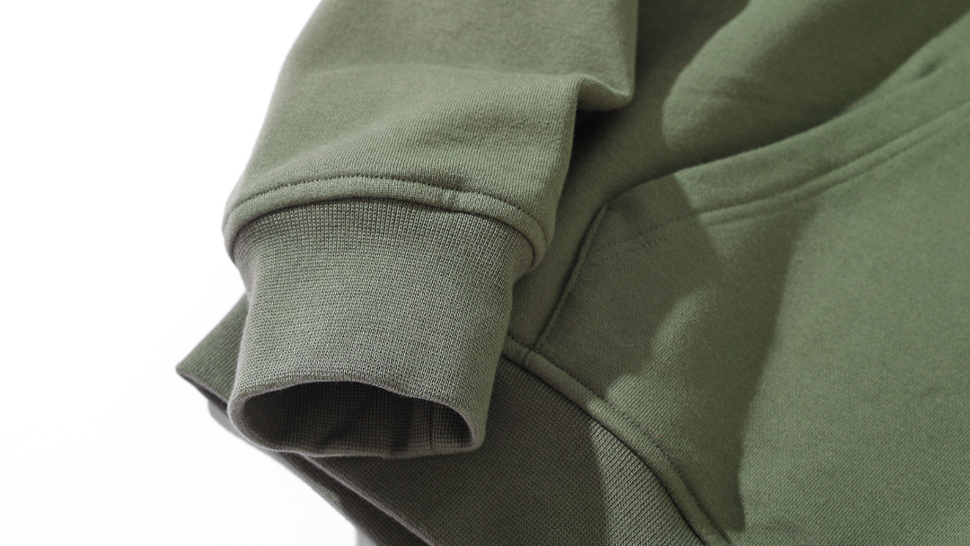 Olive green heavyweight hoodie sleeve with spandex-blended ribbed cuff
