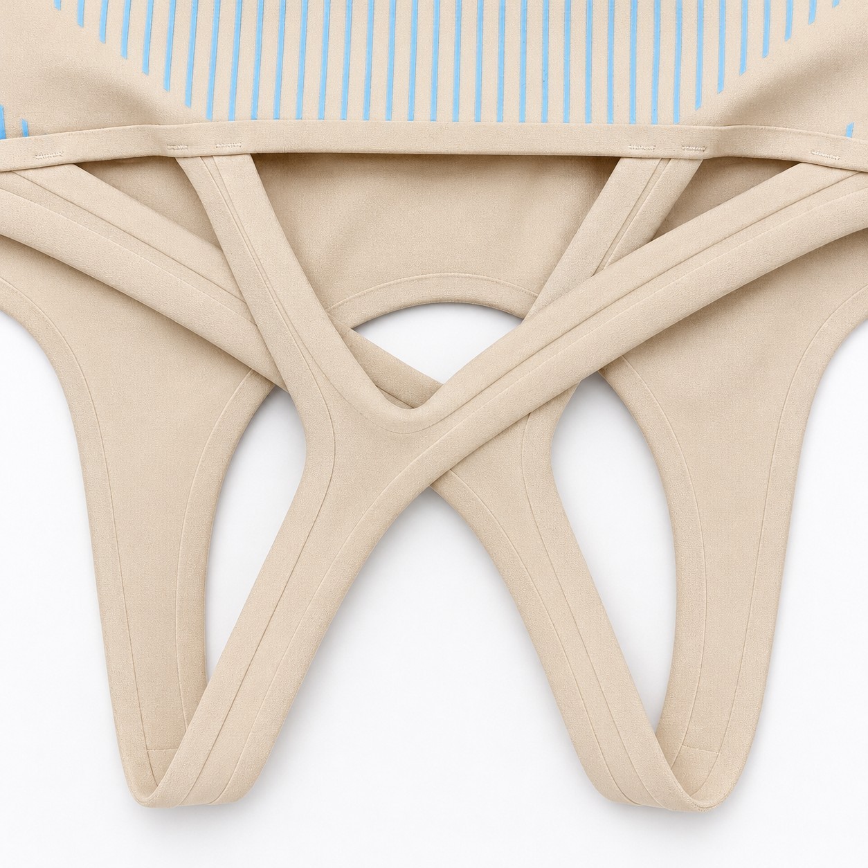 Close-up of the strappy cross back design and stitchless bonded edges on a custom sports bra.