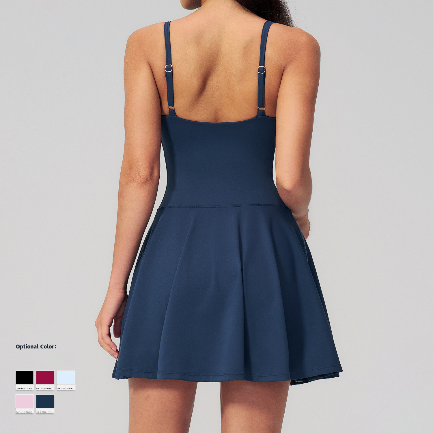 Rear view displaying the adjustable straps and back fit of a flared active dress.
