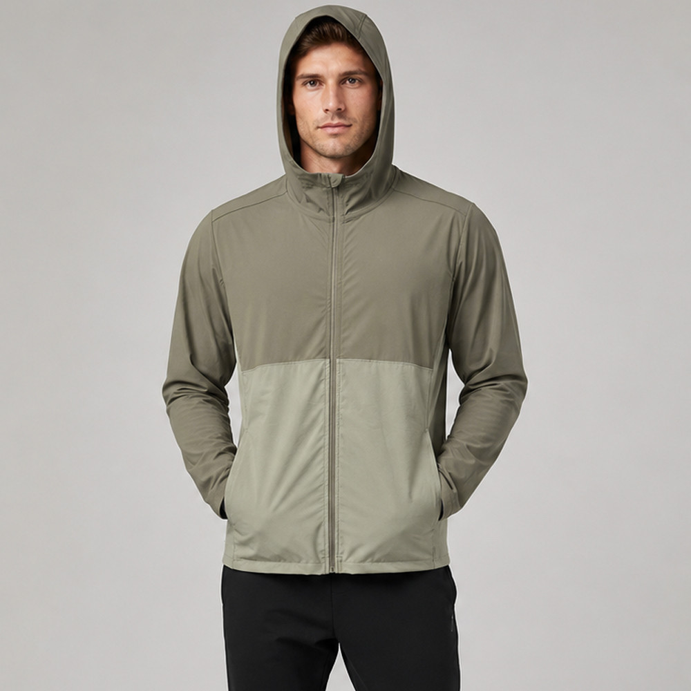 Front view demonstrating the modern color block design on a mens workout hoodie.