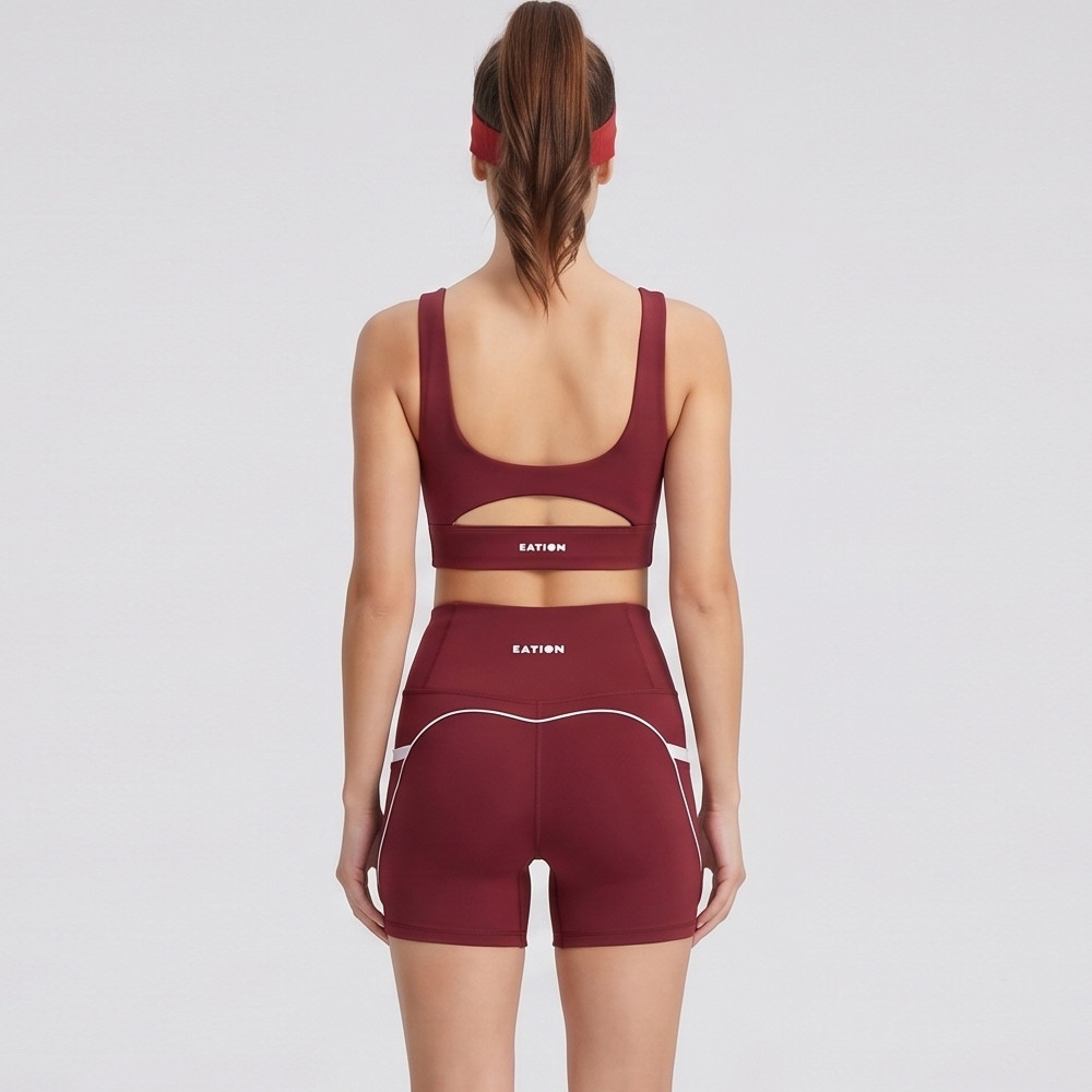 Rear view highlighting the cutout back design on the sports bra of a custom yoga set.