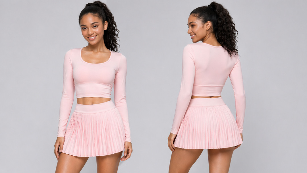 Pink long-sleeve crop top and pleated tennis skort set manufactured by Call The STYLE for a UK brand