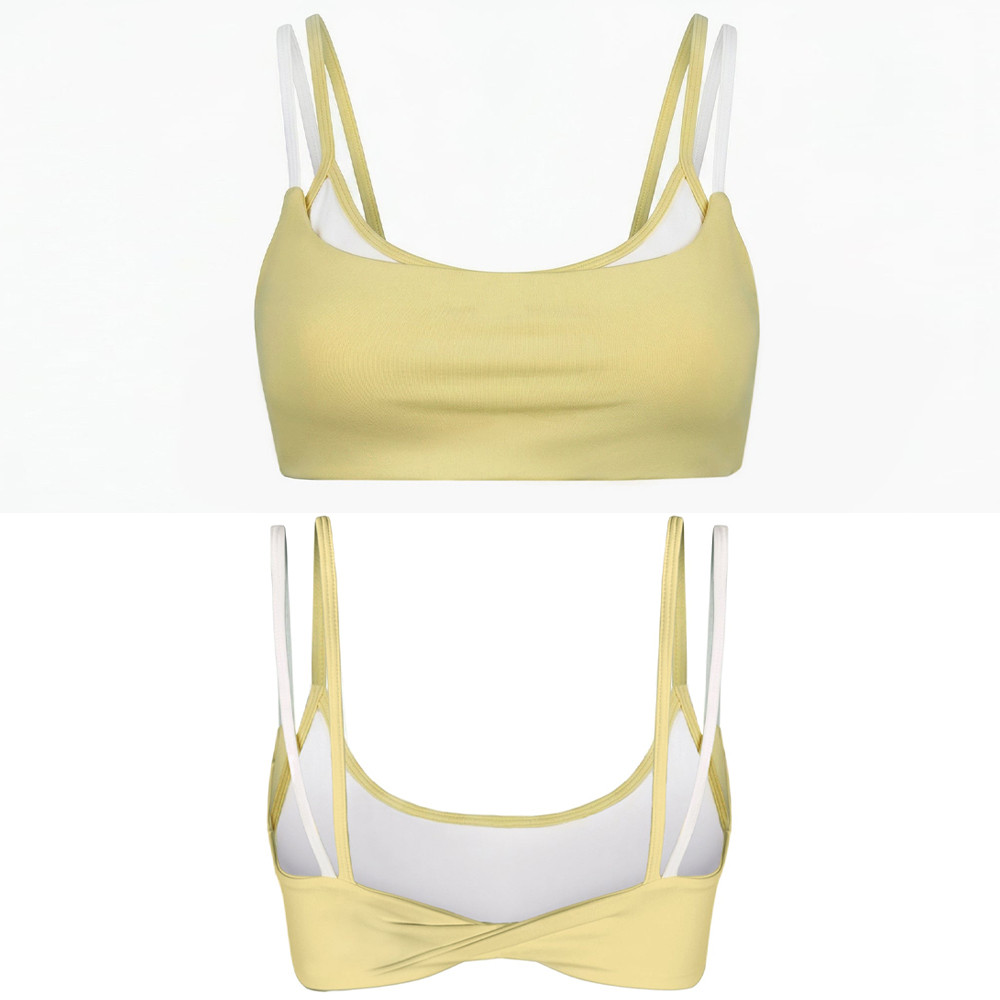 Front and back product layout of a pastel yellow double layer sports bra showing internal construction.