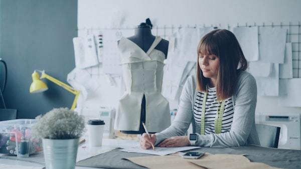 Fashion designer sketching new collection ideas