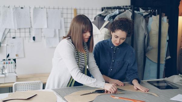 Fashion designers collaborating on a project