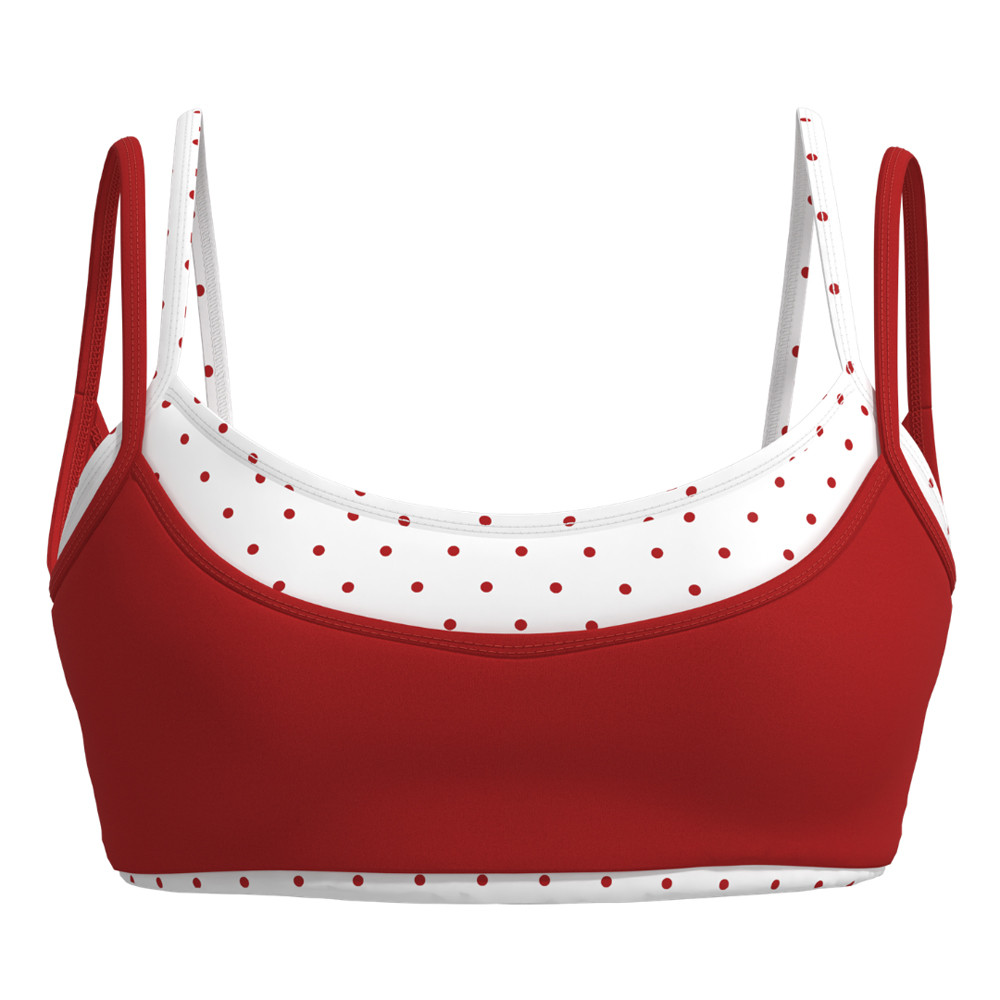 Reverse flat lay view showing the second look of the bra with red dot contrast detail