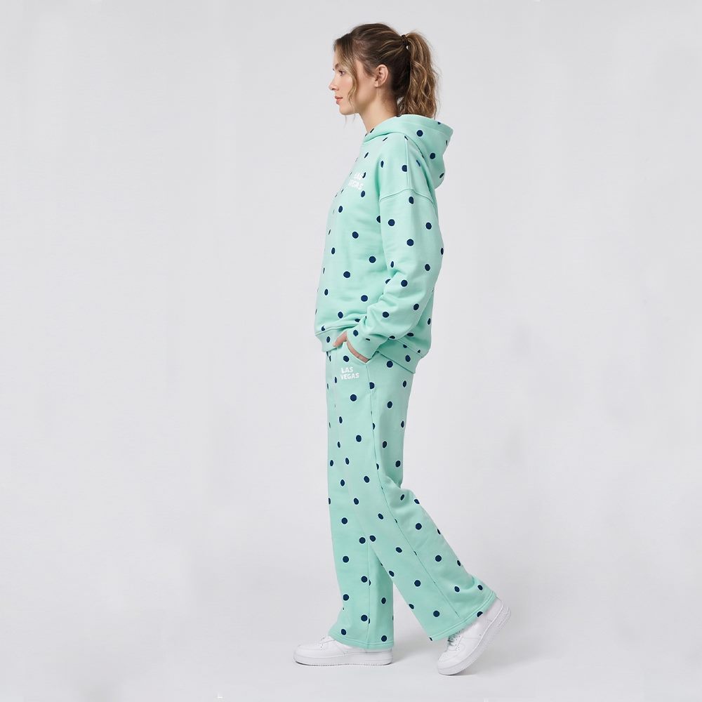 Side view of women's polka dot cotton tracksuit