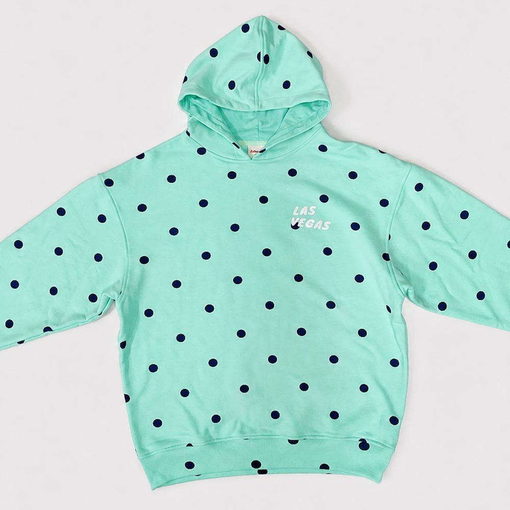 Flat front view of polka dot hooded sweatshirt