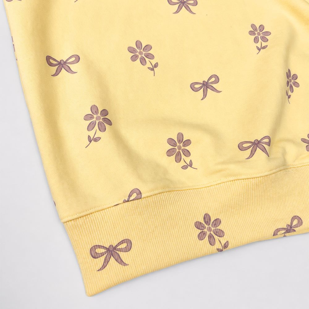 Ribbed hem detail on printed high-neck sweatshirt