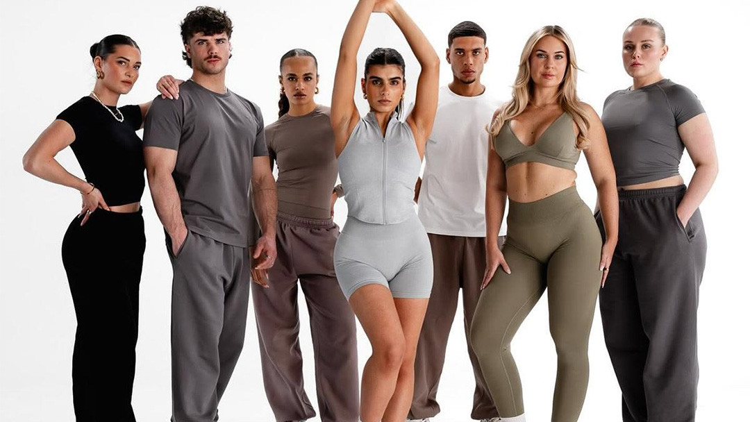 Men and women wearing different activewear and training apparel styles