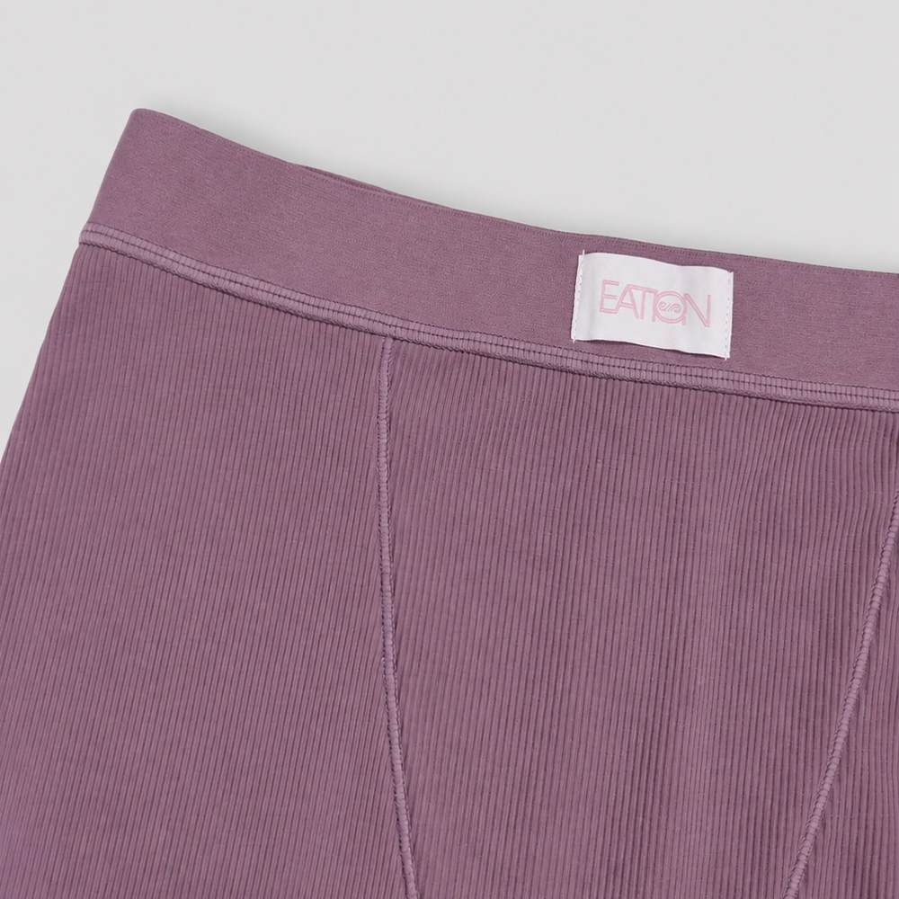 Waistband badge placement on custom rib shorts