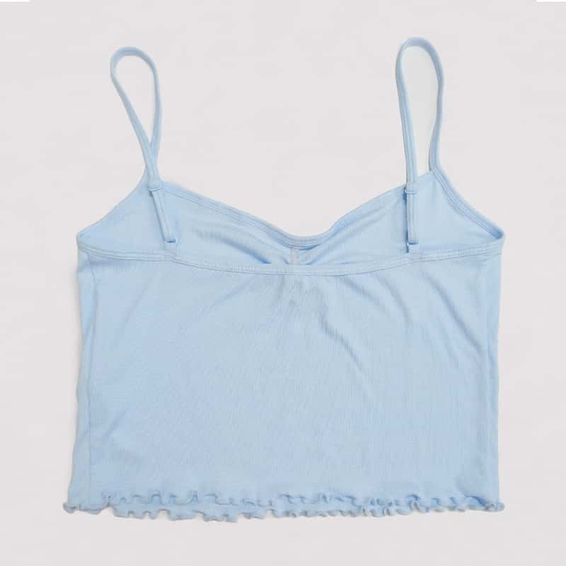 Adjustable thin shoulder straps on the ribbed camisole