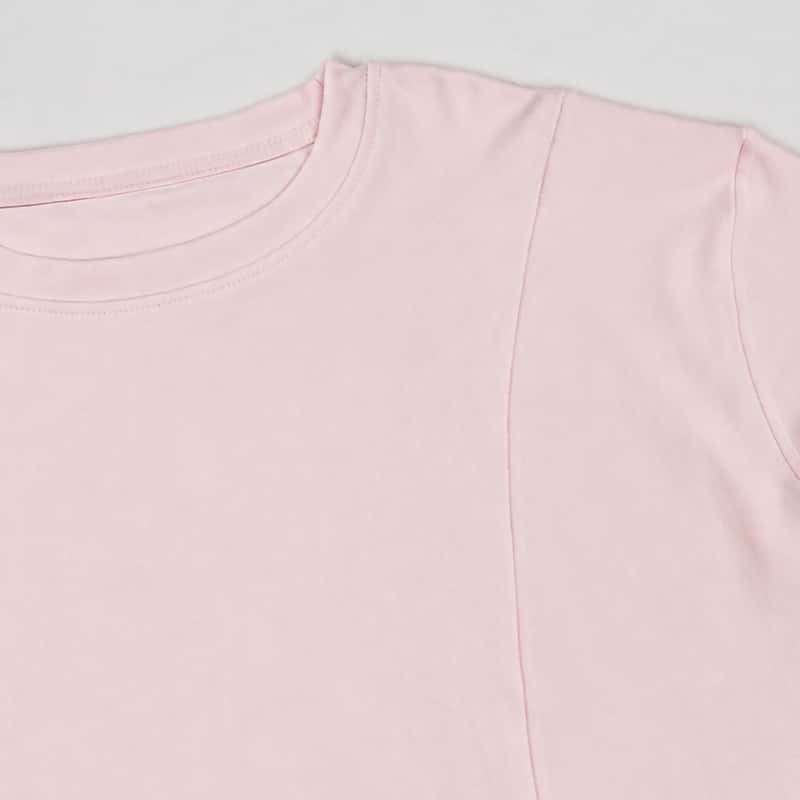 Structural seam detail on the fitted crewneck lounge top