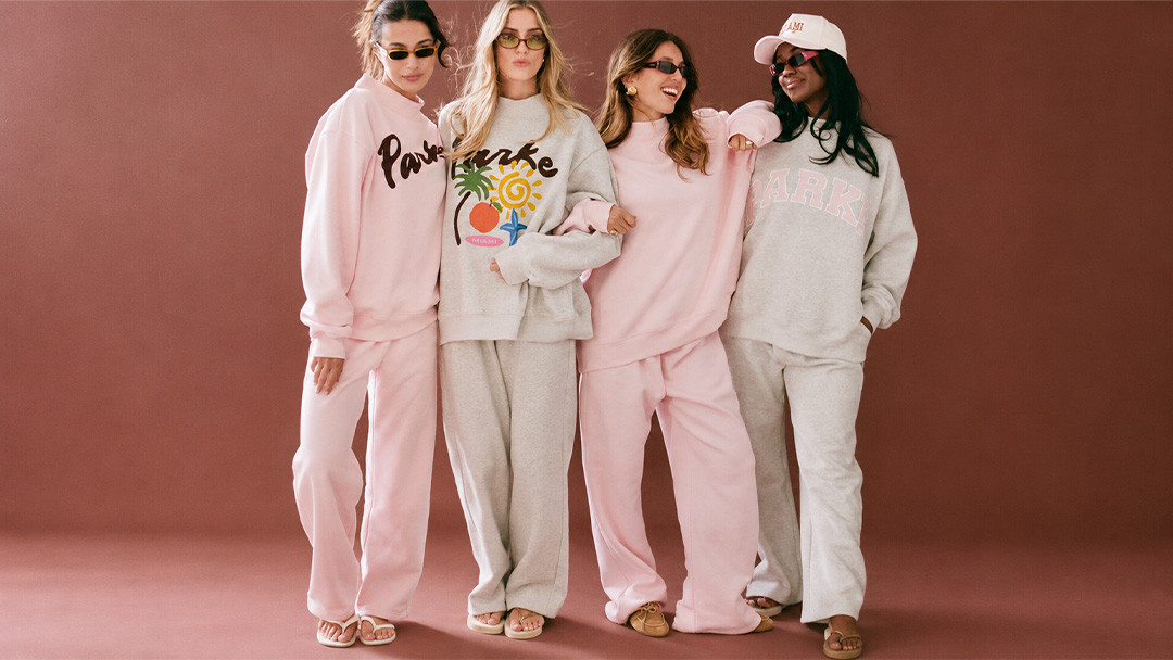 Women wearing coordinated activewear and loungewear collection for brand launch