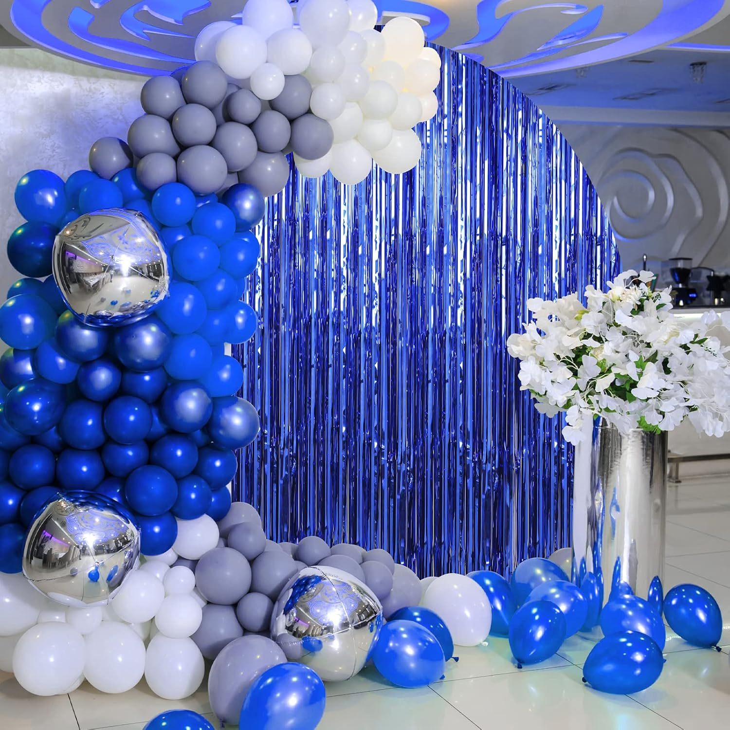 Foil Fringe Curtains vs Fabric Backdrops: A Retail Buying Comparison