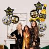 Happy New Year! Aluminum foil balloons, wine bottles, New Year's party decorations