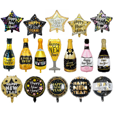 Happy New Year! Aluminum foil balloons, wine bottles, New Year's party decorations