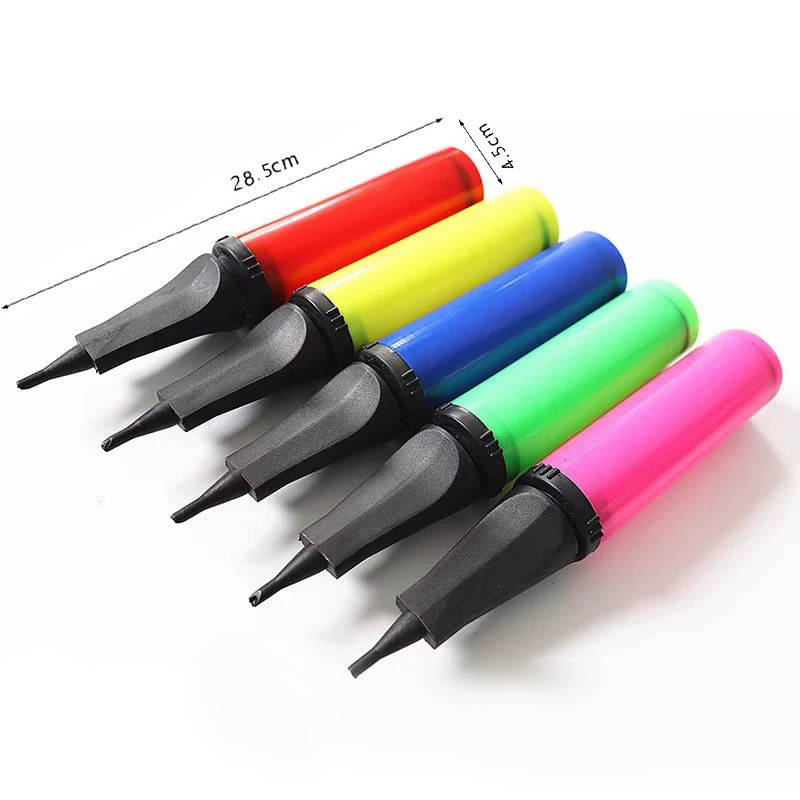Hand-operated balloon pumps in several colors