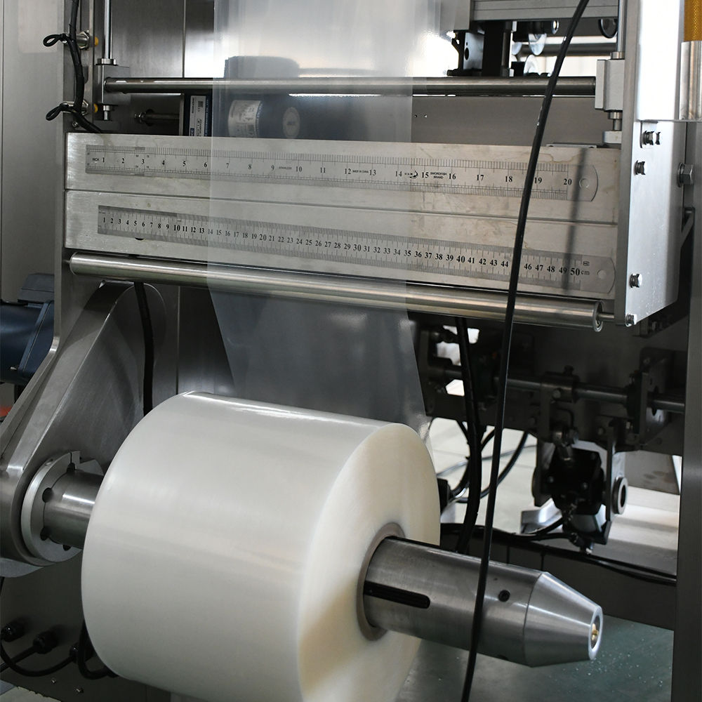 Cashew nuts VFFS packing machine — film roll unwinding and web tension control