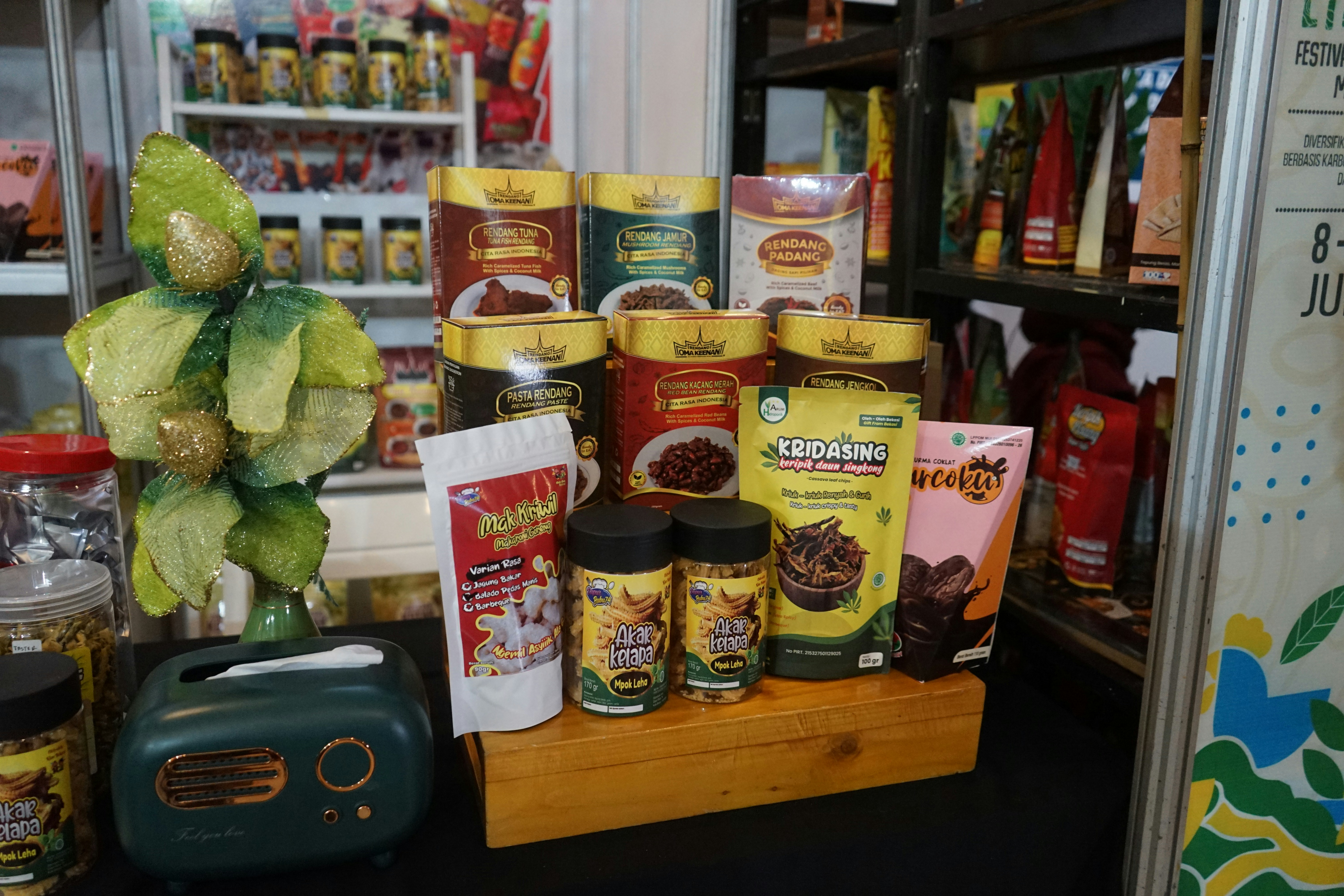 A variety of food products packaged using a VFFS machine, such as coffee, snacks, and powders.