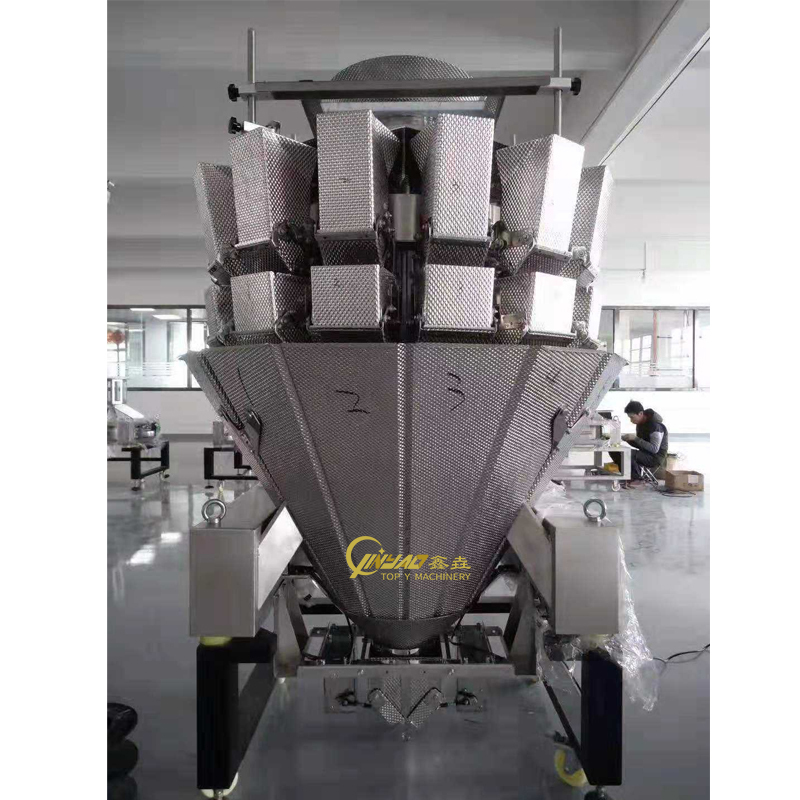 TOPY-VM automatic 14 head multihead weigher, smart weighing machine feeding real time weight data to an AI packaging system