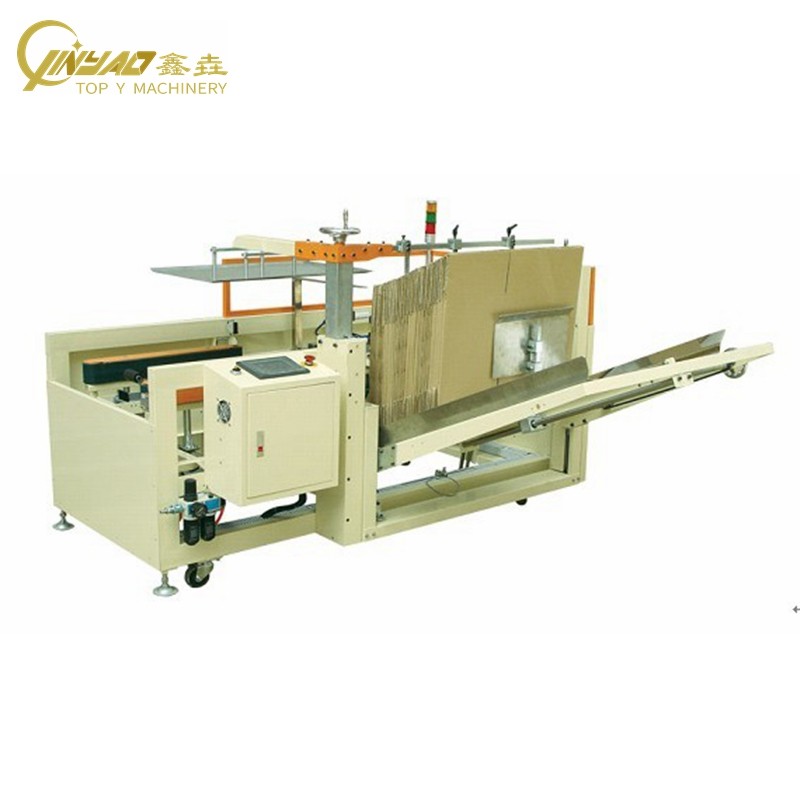 Automatic carton erector and box forming machine integrated in a TOP Y Machinery packaging line