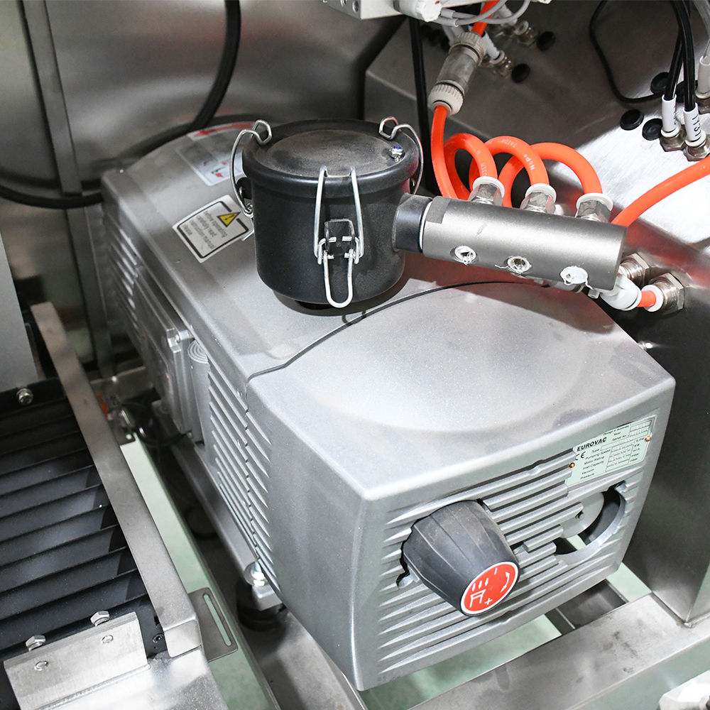 Vacuum pump and pipework connections on a food packaging line