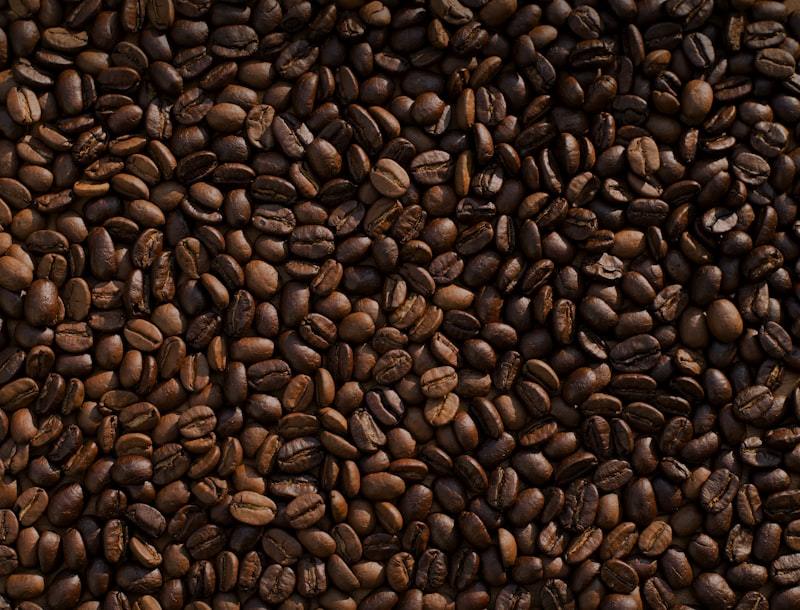 Freshly roasted coffee beans in a burlap sack ready for degassing valve packaging