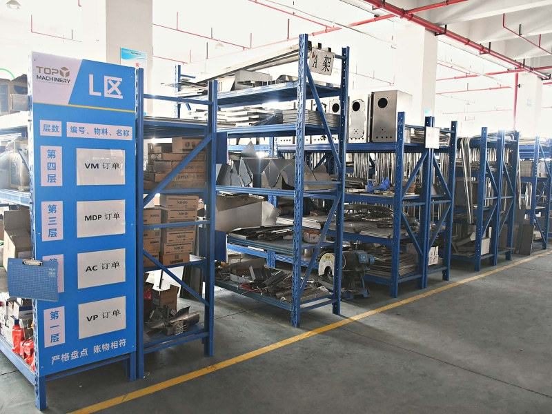 Food packaging machine parts store and order staging area at TOP Y Machinery