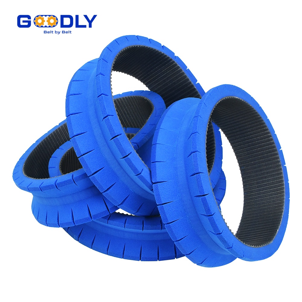 Conveyor timing belt with moulded teeth for accurate parcel indexing on sorter lines