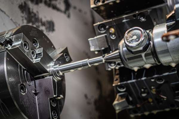 Close-up of precision CNC machined rod-shaped synchronous timing pulley