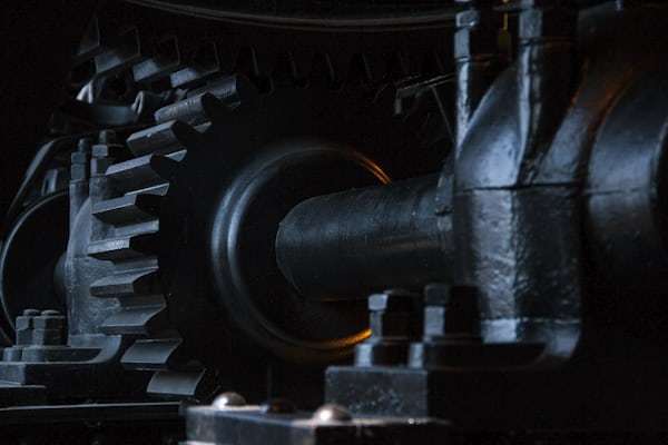 Close-up of precision engineered gears and mechanical timing components