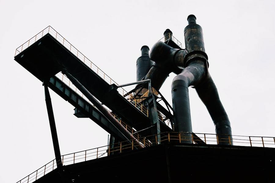 Large industrial steel structures under a pale sky