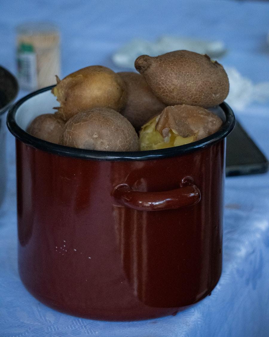 Enamel pot finished with porcelain coating in a rustic kitchen
