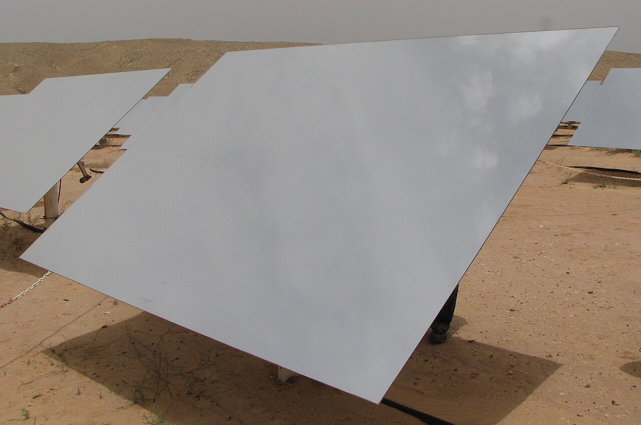Laminated steel sheets palletised and stretch-wrapped for export in the MESCO STEEL warehouse