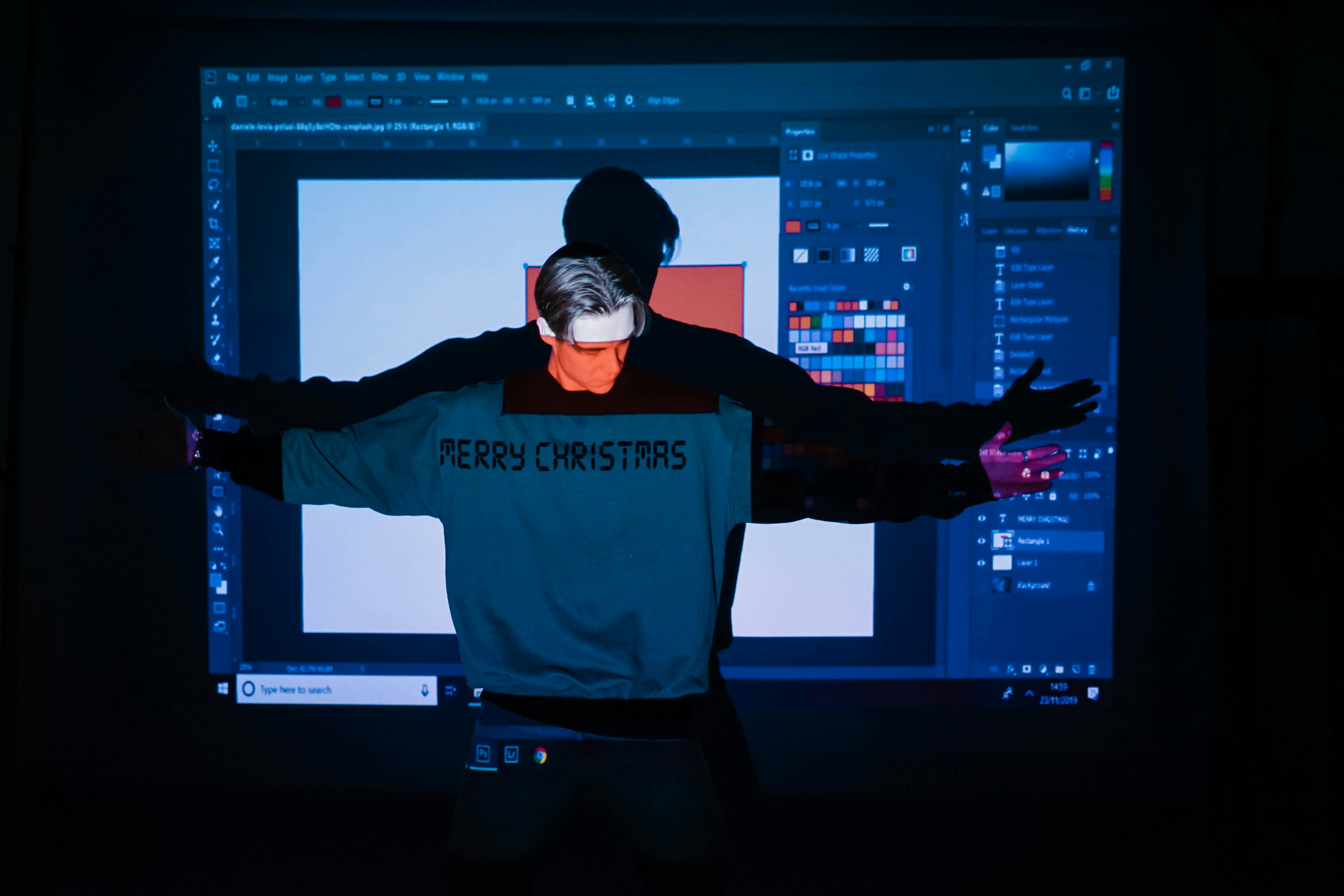 An operator using a futuristic transparent screen with AI-powered analytics and holographic projections.