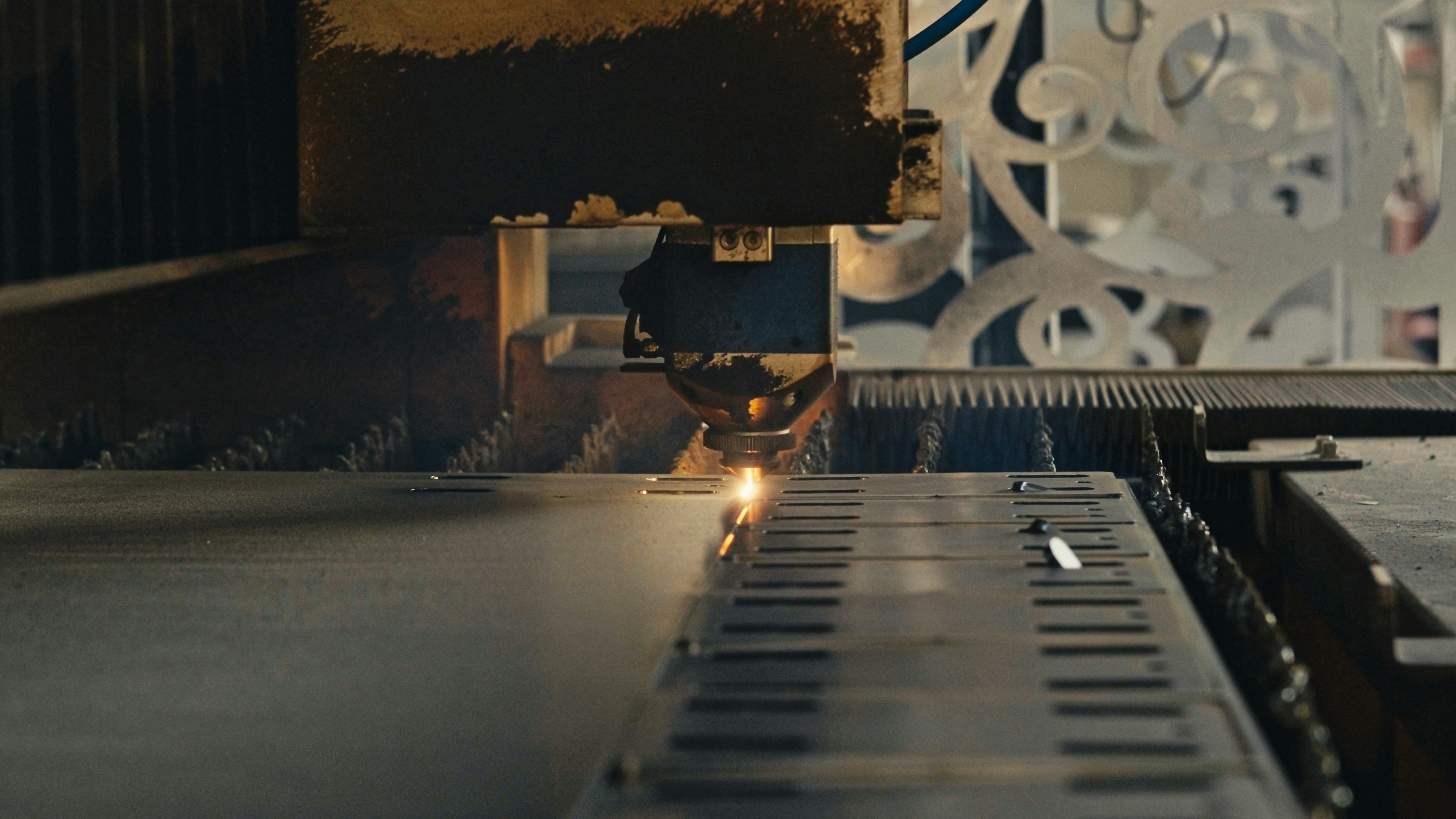One-Stop Sheet Metal Fabrication Facility An integrated sheet metal fabrication facility showing different stages like laser cutting, bending, and assembly lines working in harmony