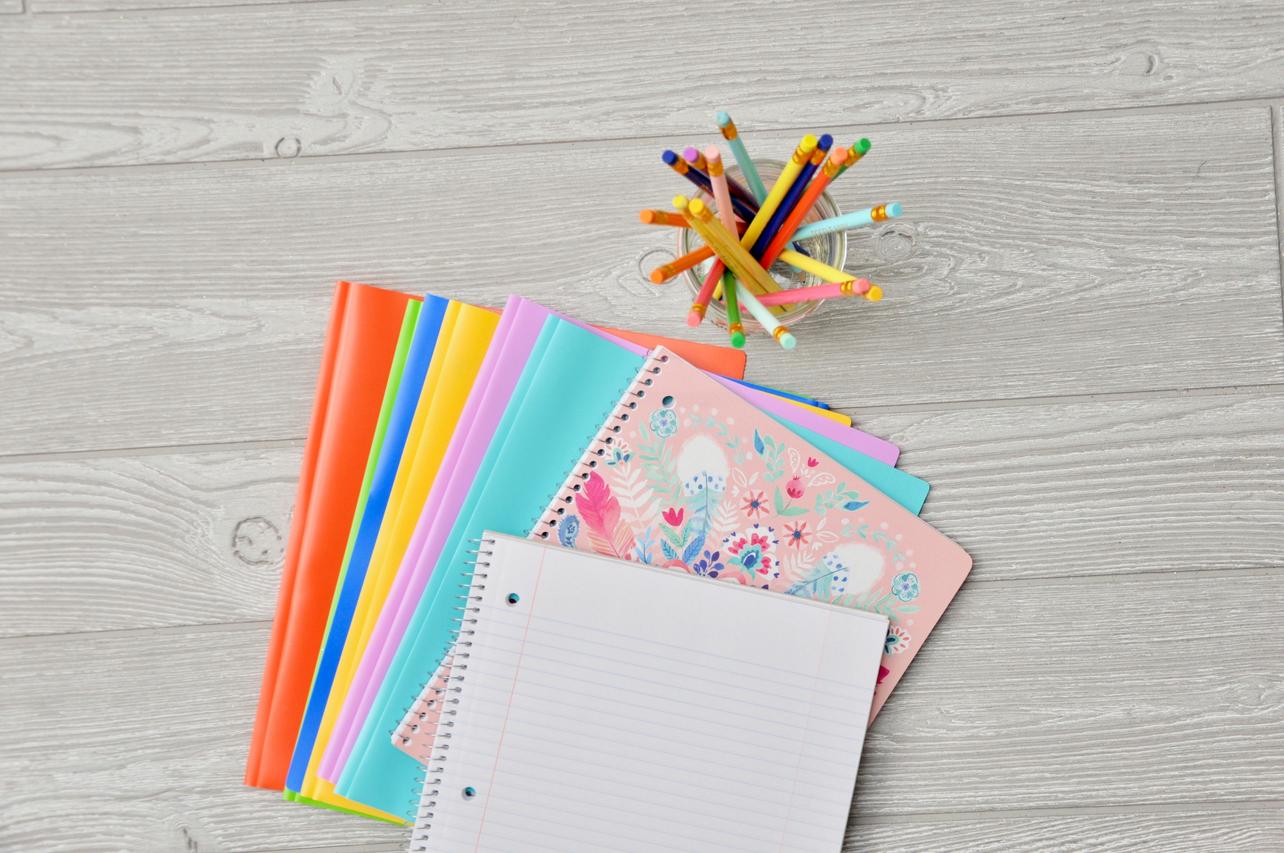 An image of a custom notebook with colorful plastic spiral binding