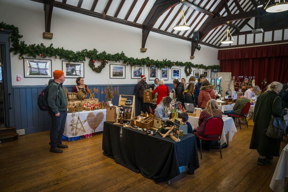 A lively themed market fair crowded with people