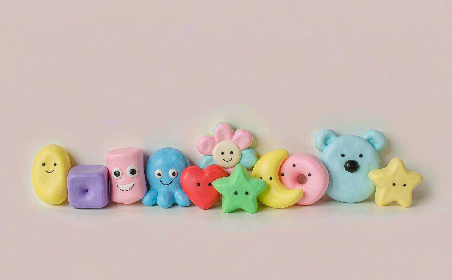 Flat lay of a pastel slow-rise squishy lineup