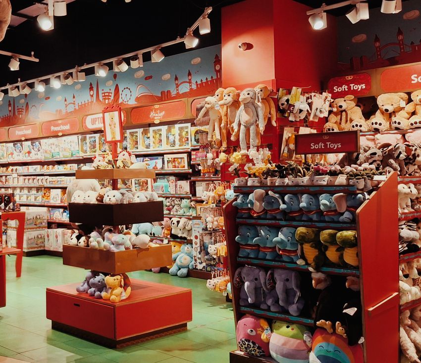 Toy store shelves stocked with children's toys